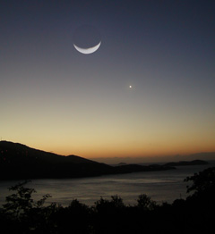 The Moon and Venus at sunset viewed from St. Thomas, U.S. Virgin Islands.